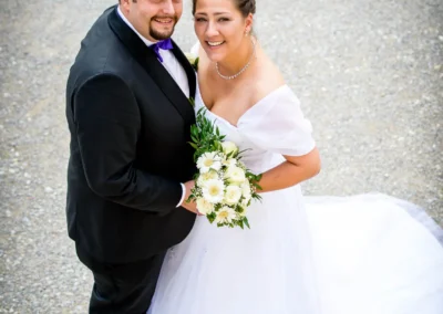 Brautpaarfoto bei ihrer Hochzeit in Schloss Nymphenburg, aufgenommen von einem Hochzeitsfotografen aus München.